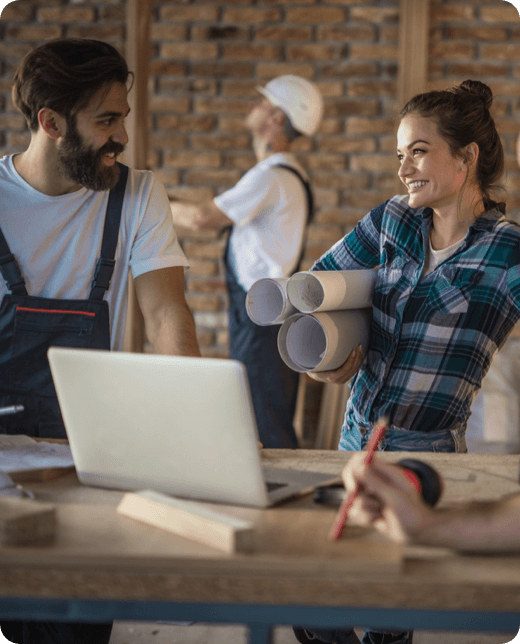 two contractors discussing at work