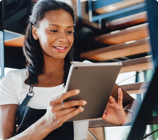 a franchisor wearing an apron