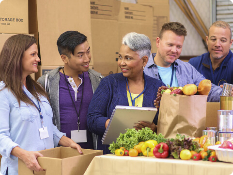 a group of people in food bank