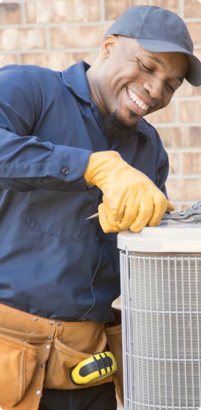 man working with a clamp in hand