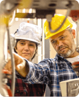 man teaching woman about pipes